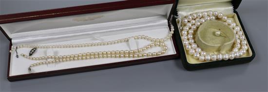 Three assorted cultured pearl necklaces.